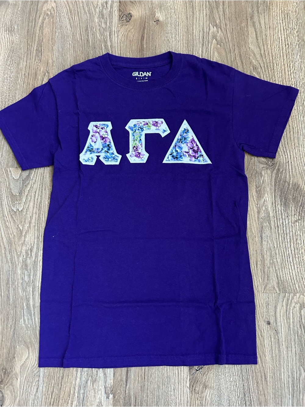 Alpha Gamma Delta Greek Letter T-Shirt with Floral Appliqué